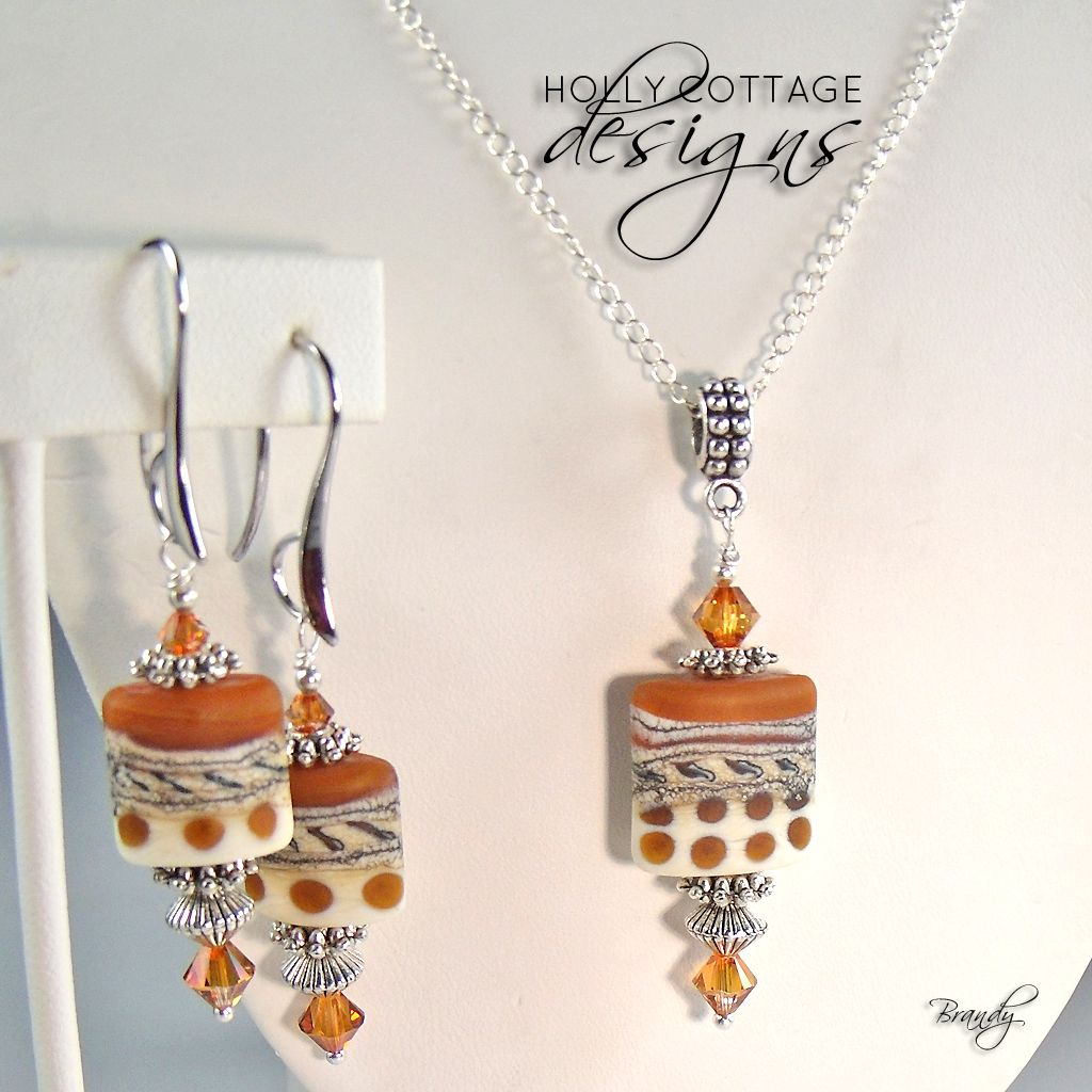 Artisan crafted lampwork pendant on chain with matching earrings Artisan crafted lampwork pendant on chain with matching earrings