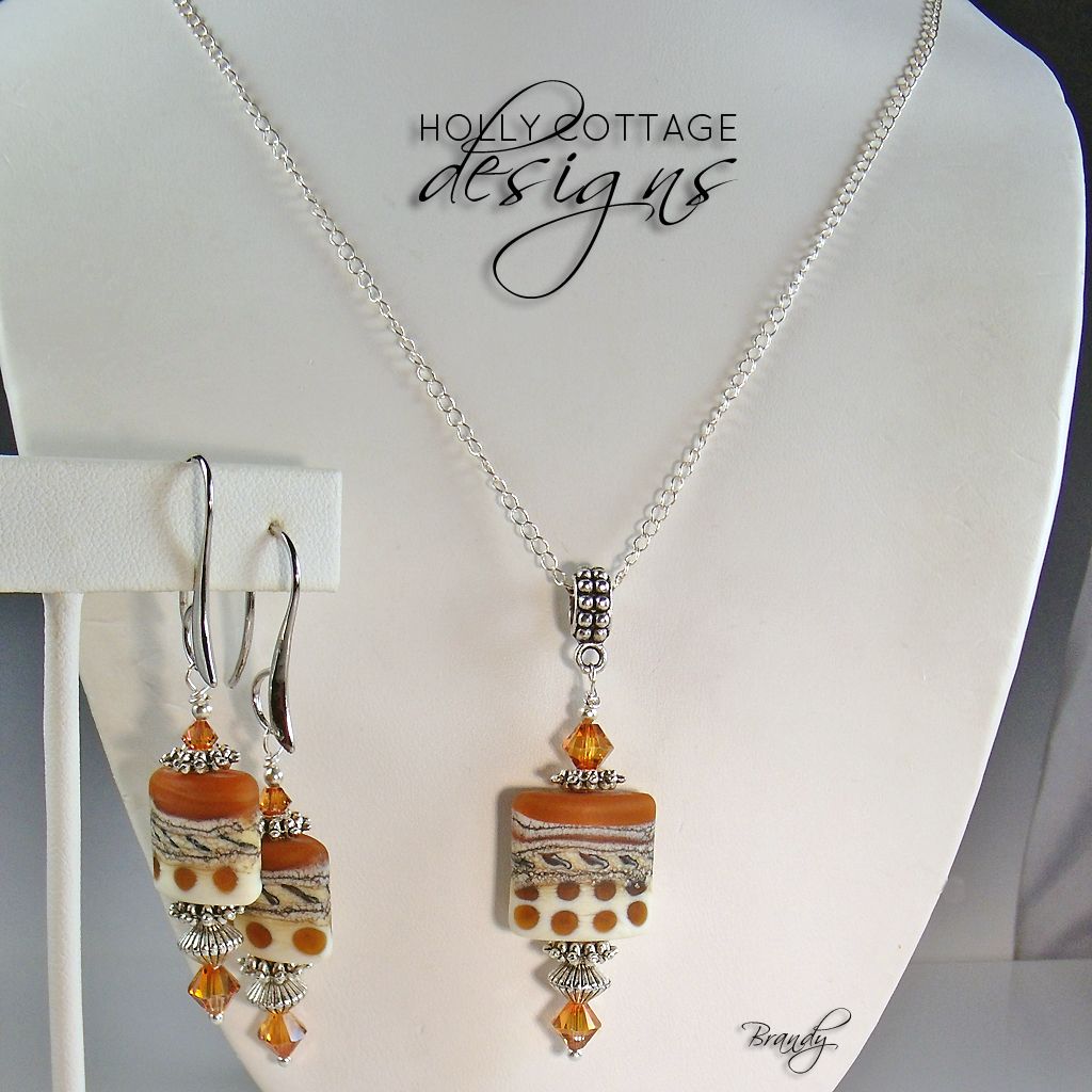 Artisan crafted lampwork pendant on chain with matching earrings Artisan crafted lampwork pendant on chain with matching earrings