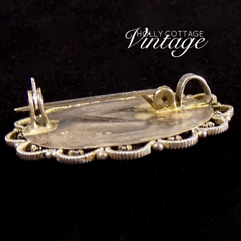 Vintage sterling silver and tiger eye brooch/pendant Vintage sterling silver and tiger eye brooch/pendant