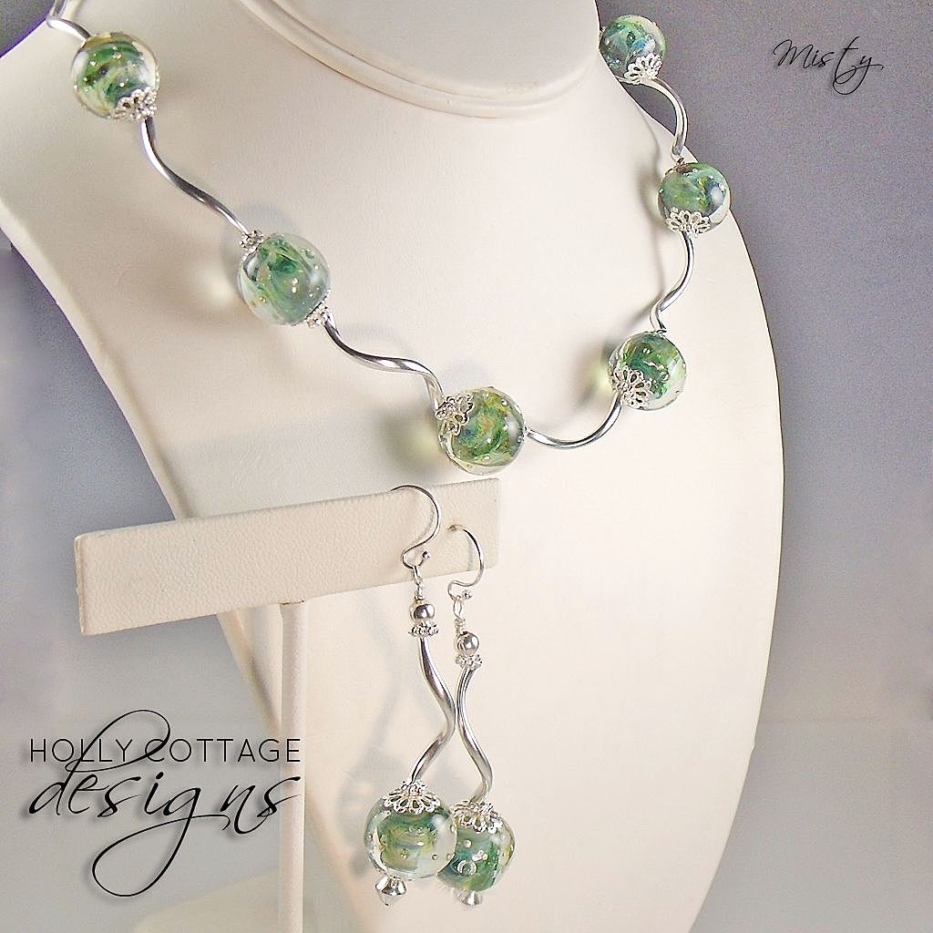 Artisan crafted necklace and earring set Artisan crafted necklace and earring set