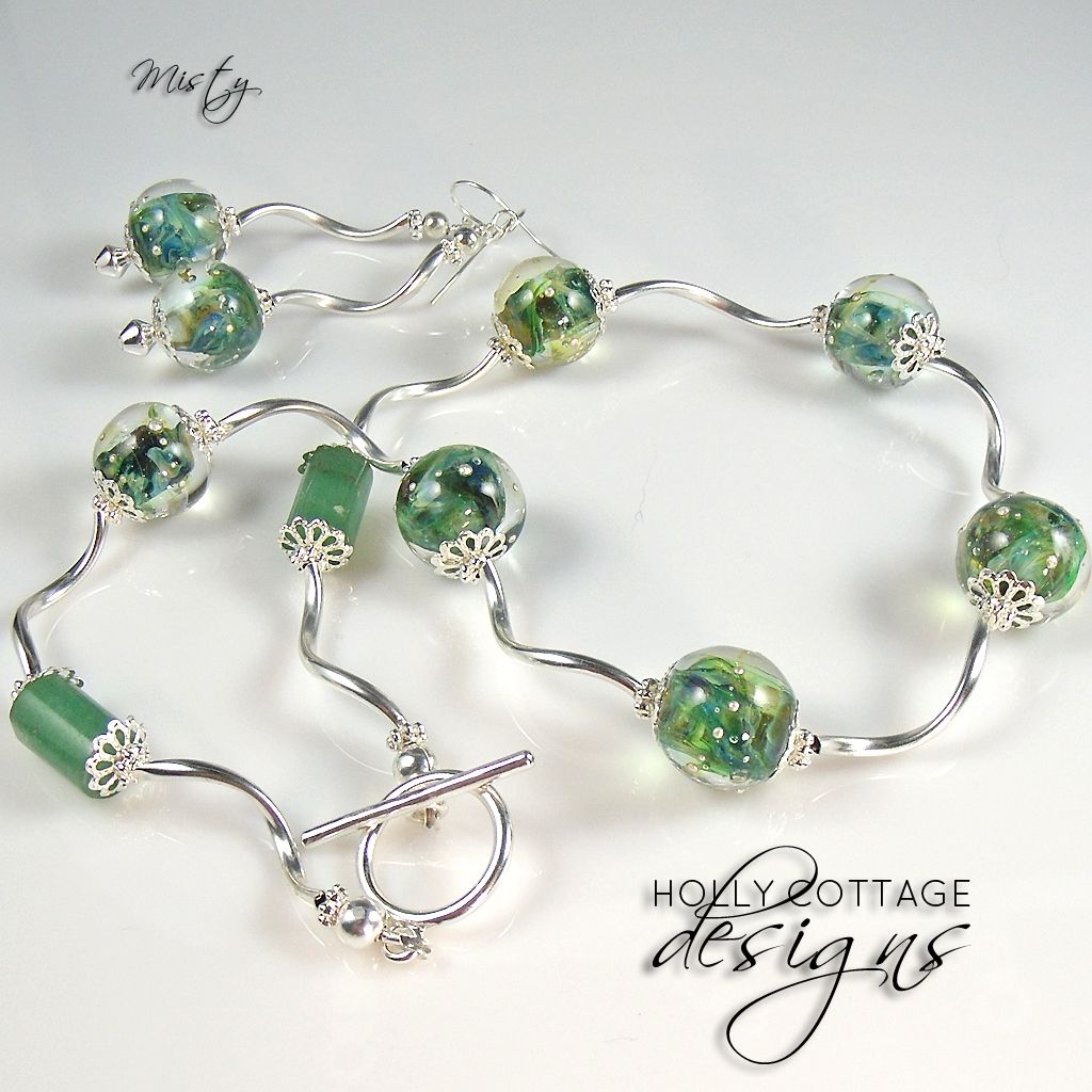 Artisan crafted necklace and earring set Artisan crafted necklace and earring set