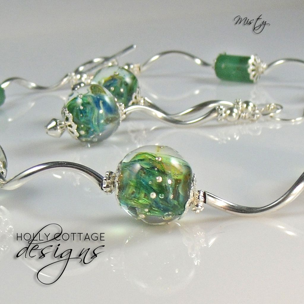 Artisan crafted necklace and earring set Artisan crafted necklace and earring set