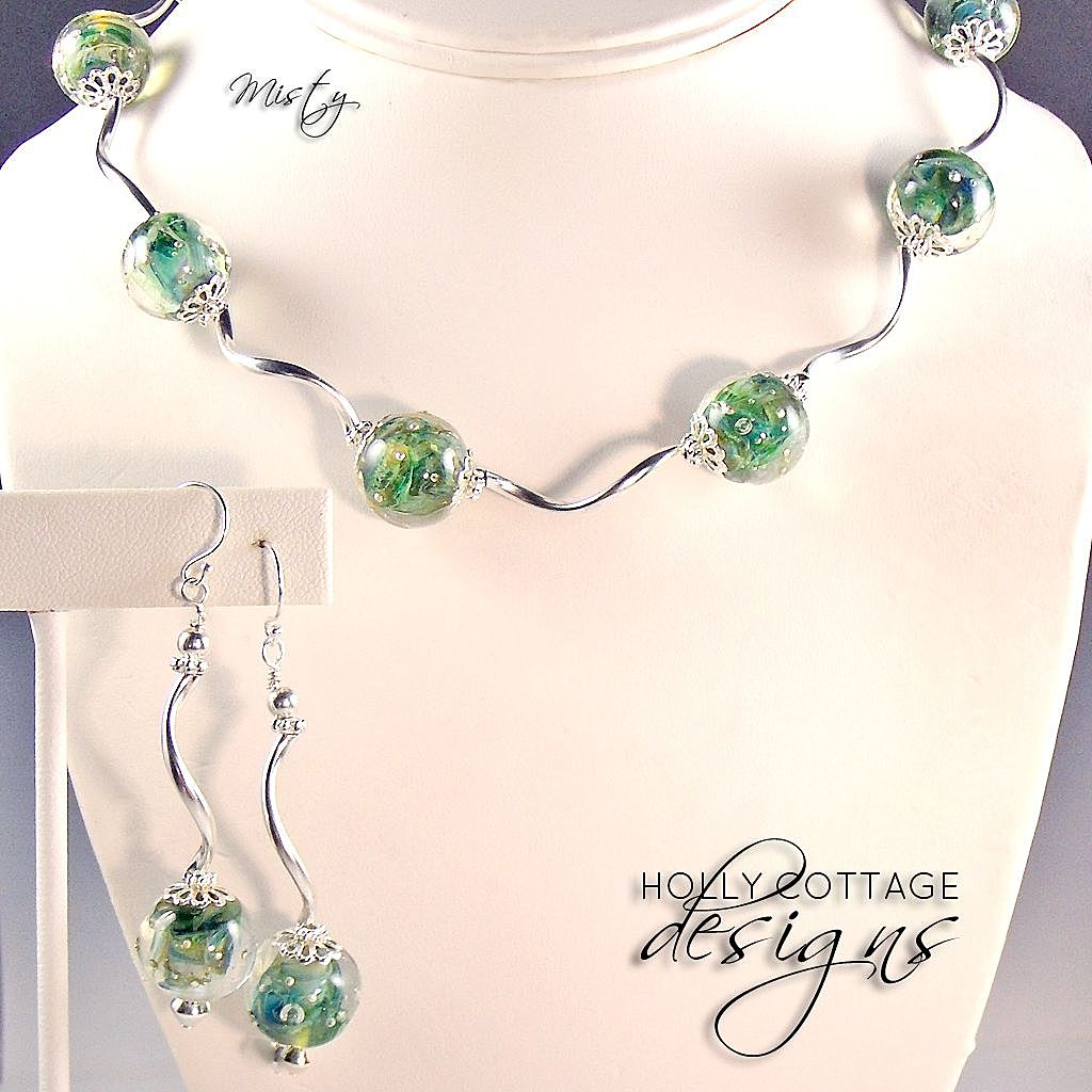 Artisan crafted necklace and earring set Artisan crafted necklace and earring set