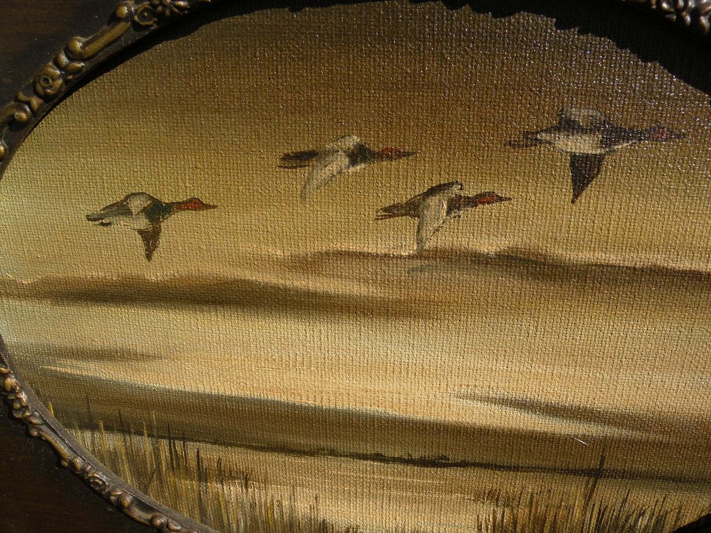 Decorative painting of ducks flying over a marsh Decorative painting of ducks flying over a marsh