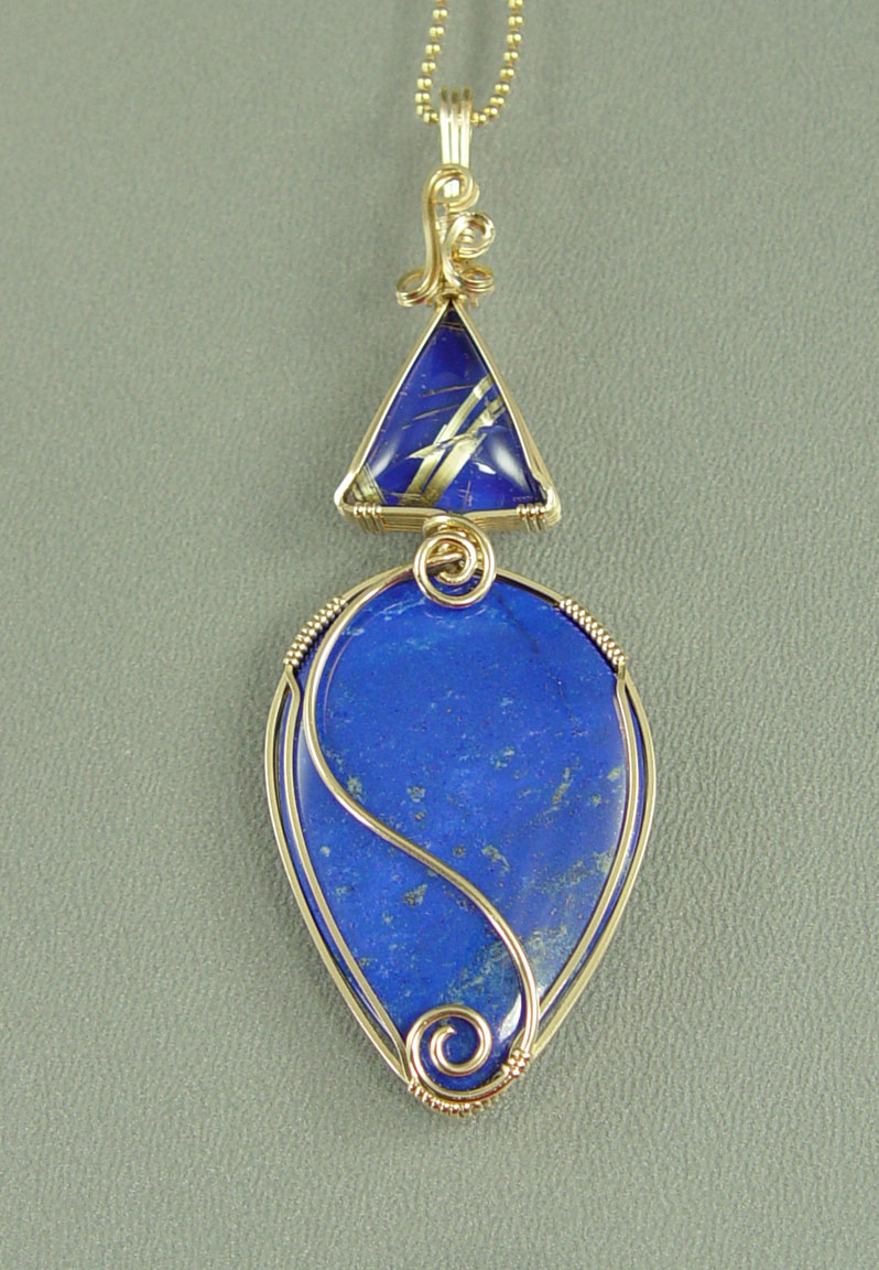 "Happy Blues" Lapis and Rutilated Quartz Wire-Wrapped Pendant "Happy Blues" Lapis and Rutilated Quartz Wire-Wrapped Pendant