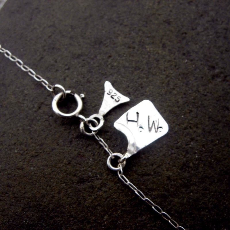 Nestling Hematite and Sterling Silver Heart Pendant Necklace Nestling Hematite and Sterling Silver Heart Pendant Necklace