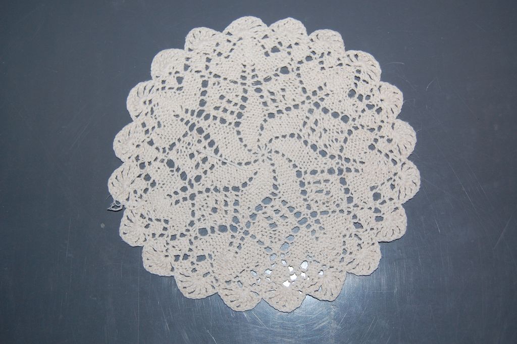 Lovely vintage Knitted doily, circular cream star Lovely vintage Knitted doily, circular cream star