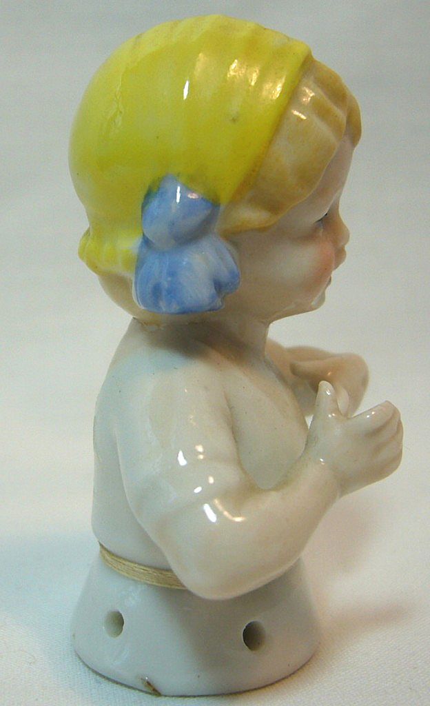 German China Child Half Doll in Yellow Bonnet with Blue Bows German China Child Half Doll in Yellow Bonnet with Blue Bows