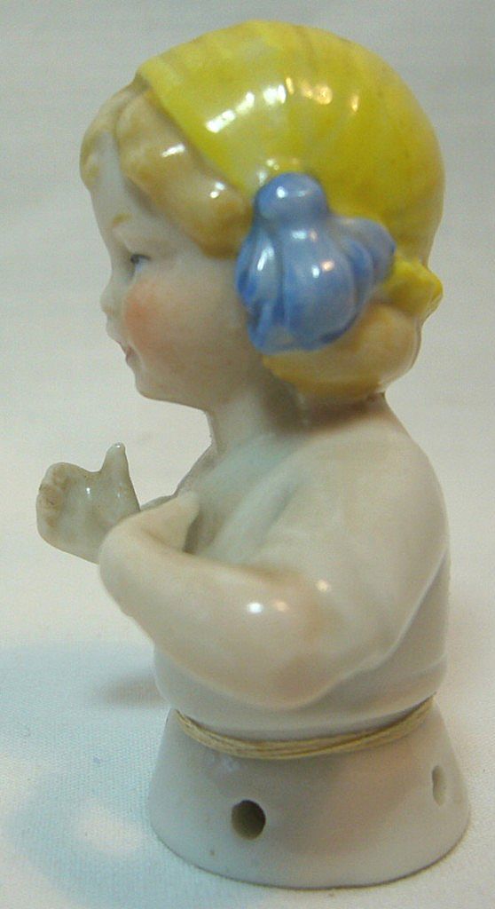 German China Child Half Doll in Yellow Bonnet with Blue Bows German China Child Half Doll in Yellow Bonnet with Blue Bows
