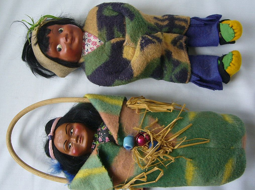 A Pair of Native American Cloth and Composition Dolls A Pair of Native American Cloth and Composition Dolls