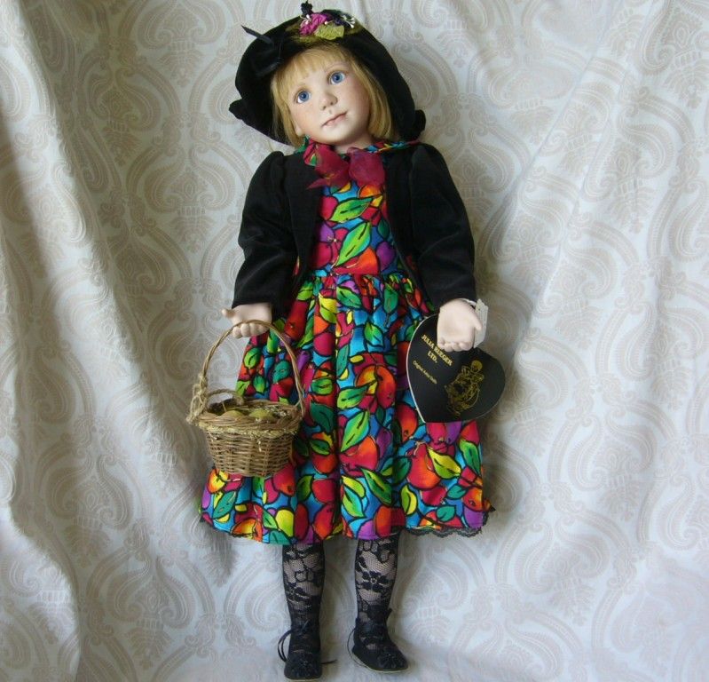 "Apple Annie" Limited Edition Porcelain Doll by Julia Rueger "Apple Annie" Limited Edition Porcelain Doll by Julia Rueger