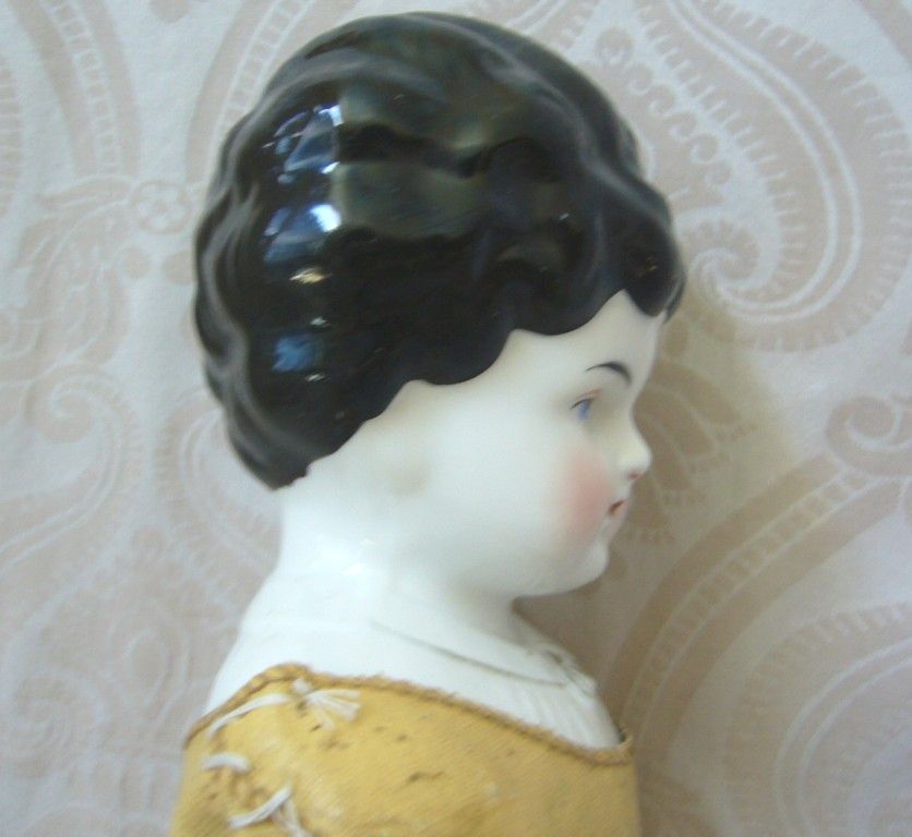 Hertwig German Glazed Porcelain China Head Doll with Blouse Detail Hertwig German Glazed Porcelain China Head Doll with Blouse Detail