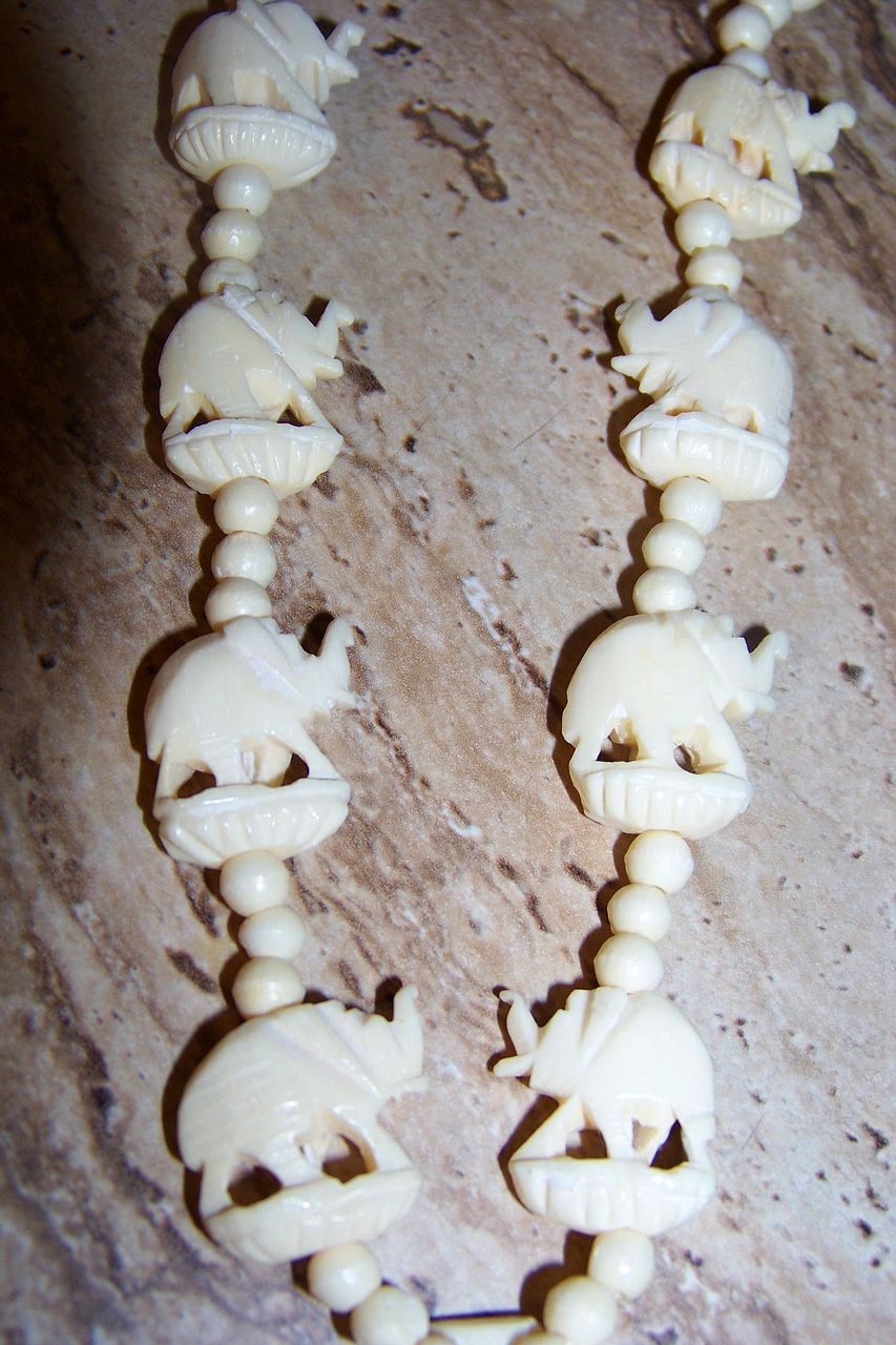 Carved Bone 13 Elephant Necklace w/ Screw Closure Carved Bone 13 Elephant Necklace w/ Screw Closure