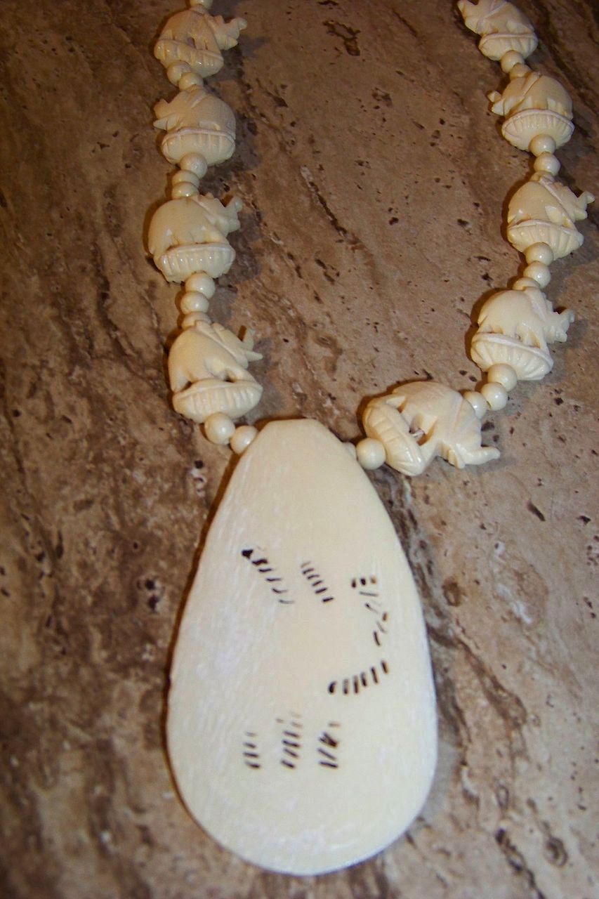 Carved Bone 13 Elephant Necklace w/ Screw Closure Carved Bone 13 Elephant Necklace w/ Screw Closure
