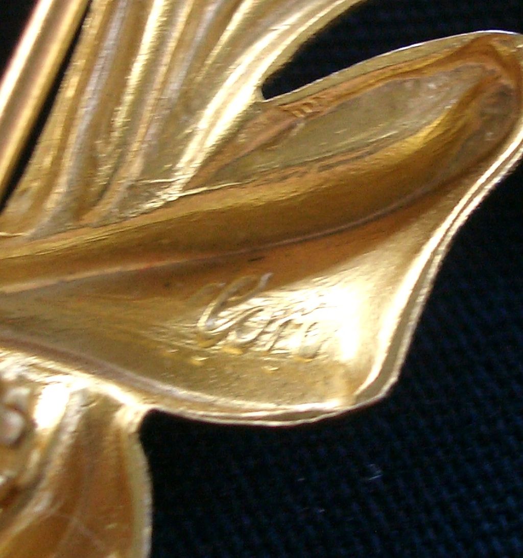 Vintage CORO Flower Bouquet pin with Blue Glass Stones Gold Tone Vintage CORO Flower Bouquet pin with Blue Glass Stones Gold Tone