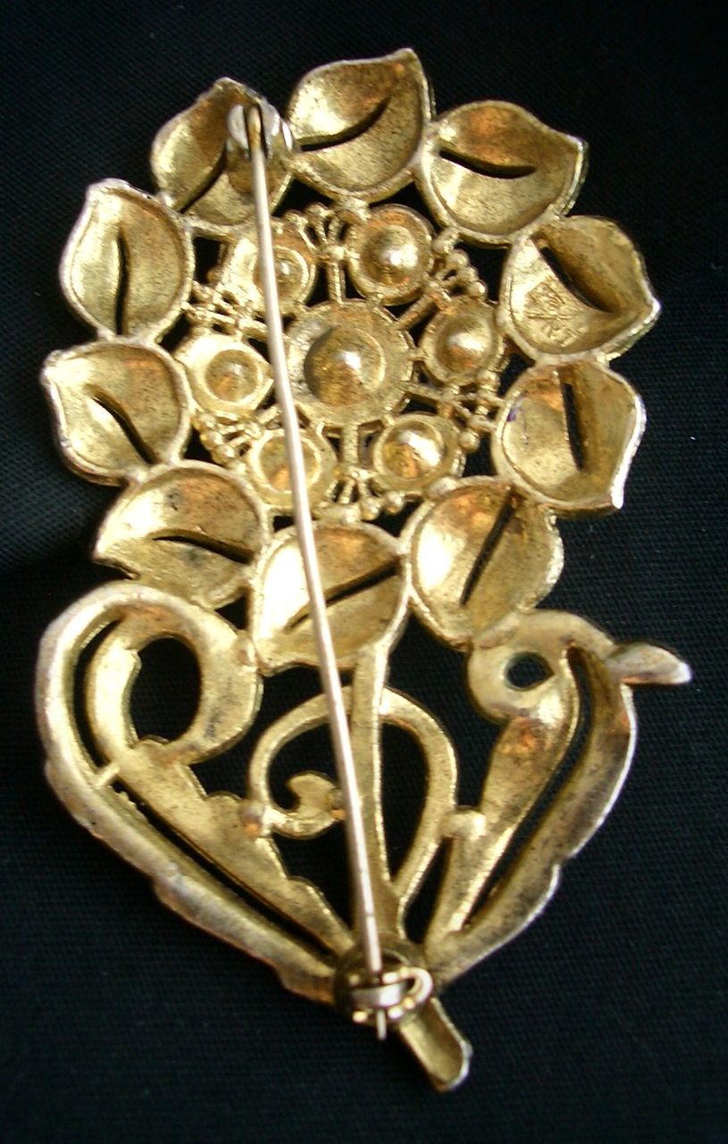 Early Metal Flower Pin with Rhinestone center Gold Tone Early Metal Flower Pin with Rhinestone center Gold Tone