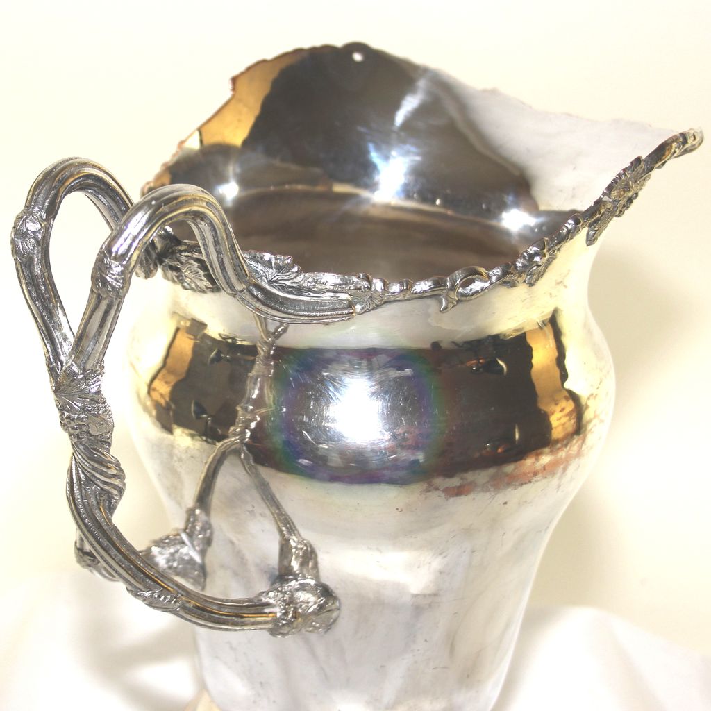 Ornate silver plate large pitcher/jug with grapes and vine handle Ornate silver plate large pitcher/jug with grapes and vine handle