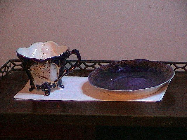 Flow Blue Cup and Saucer Flow Blue Cup and Saucer