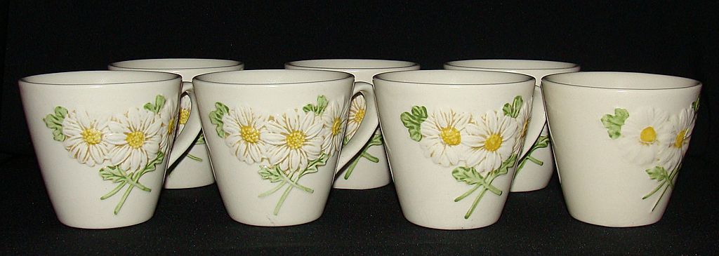 Metlox Poppy Trail "Sculptured Daisy" Cups, Set of 7 Metlox Poppy Trail "Sculptured Daisy" Cups, Set of 7