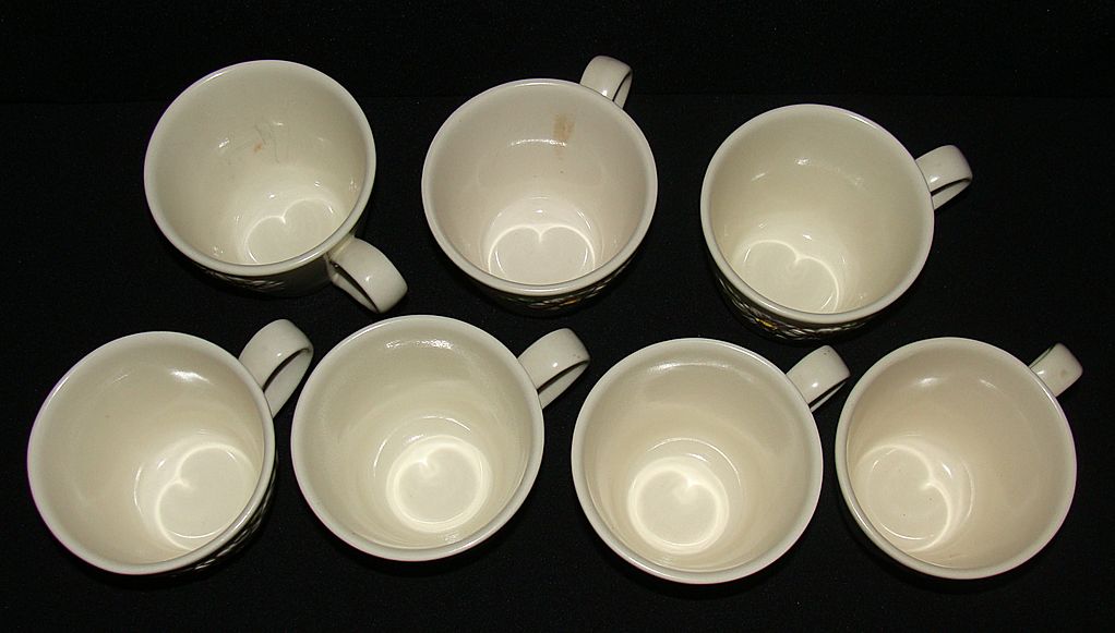 Metlox Poppy Trail "Sculptured Daisy" Cups, Set of 7 Metlox Poppy Trail "Sculptured Daisy" Cups, Set of 7