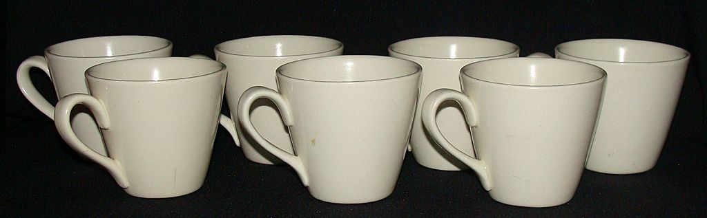 Metlox Poppy Trail "Sculptured Daisy" Cups, Set of 7 Metlox Poppy Trail "Sculptured Daisy" Cups, Set of 7