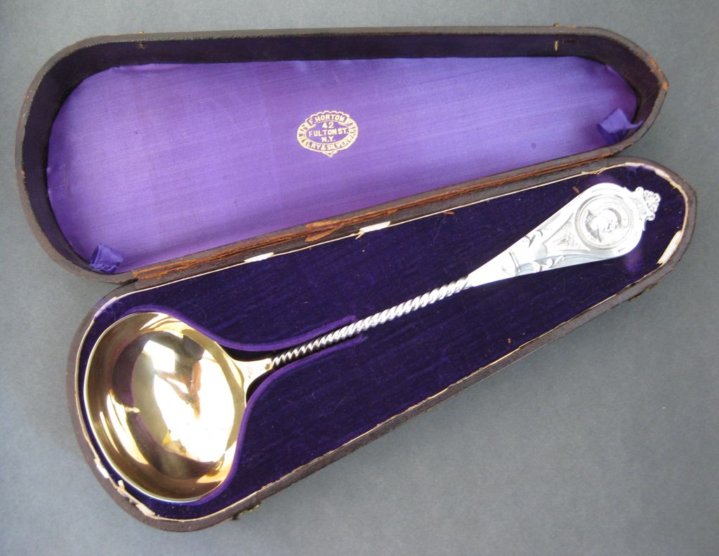 Albert Coles Medallion Pattern Coin Silver and Gilt Twisted Handle Ladle Albert Coles Medallion Pattern Coin Silver and Gilt Twisted Handle Ladle