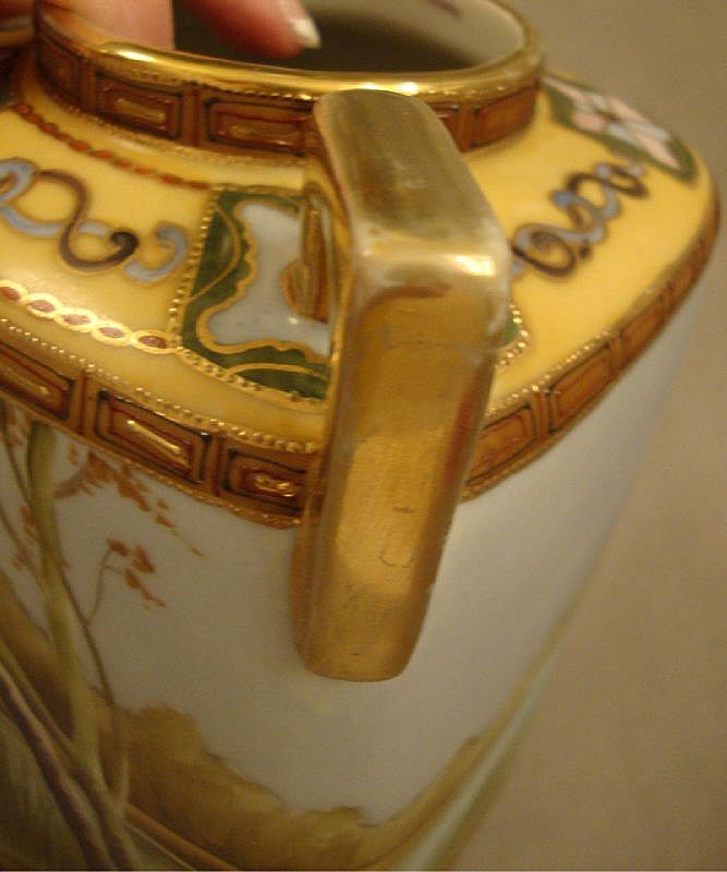 Handpainted Nippon Scenic vase with a man fishing Handpainted Nippon Scenic vase with a man fishing