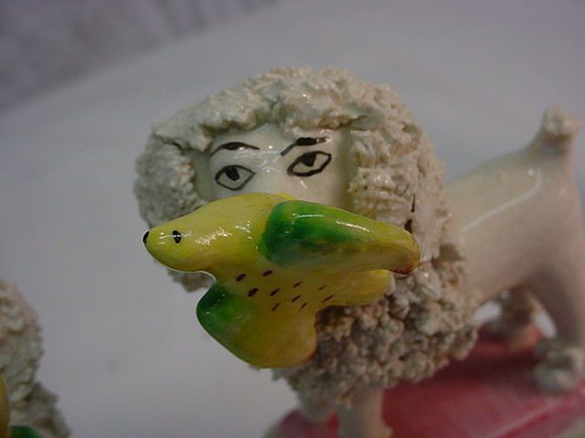 Matched Pair Staffordshire Poodle with Bird Figurine Matched Pair Staffordshire Poodle with Bird Figurine