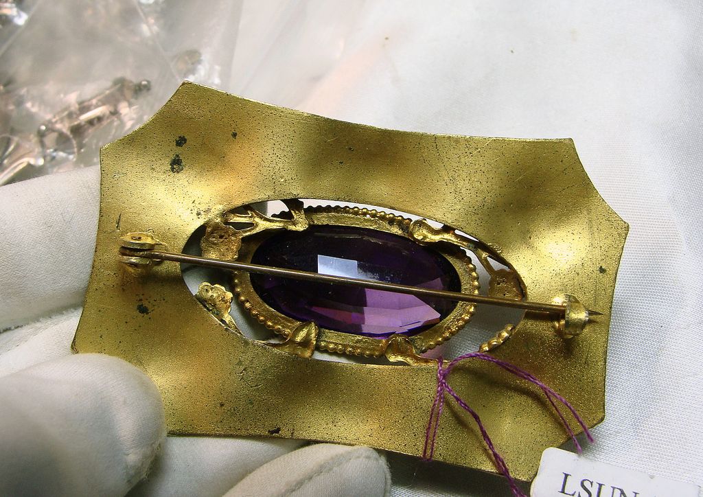 Victorian Sash Brooch in Gold Over Brass with Amethyst Color Oval Stone Victorian Sash Brooch in Gold Over Brass with Amethyst Color Oval Stone