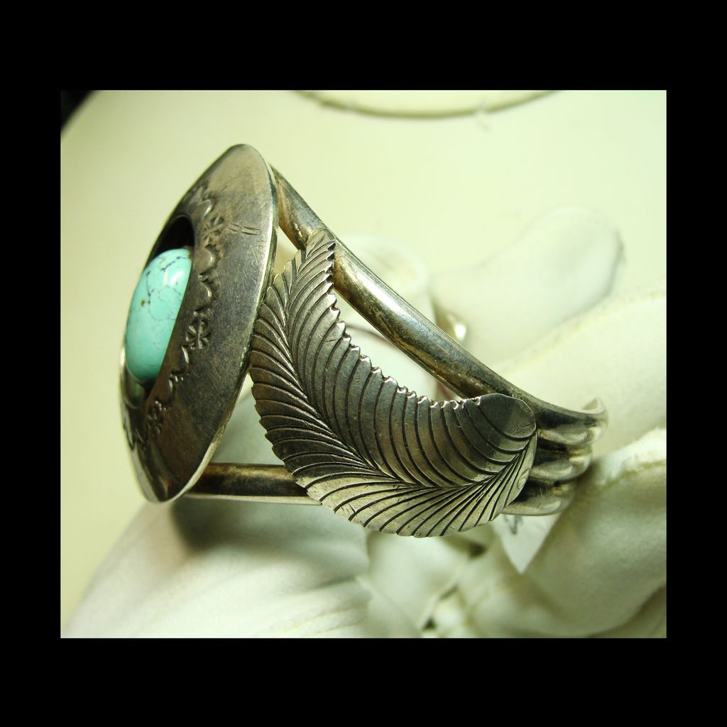 Kingman Turquoise and Sterling Silver Cuff Bracelet with Silver Overlay Kingman Turquoise and Sterling Silver Cuff Bracelet with Silver Overlay