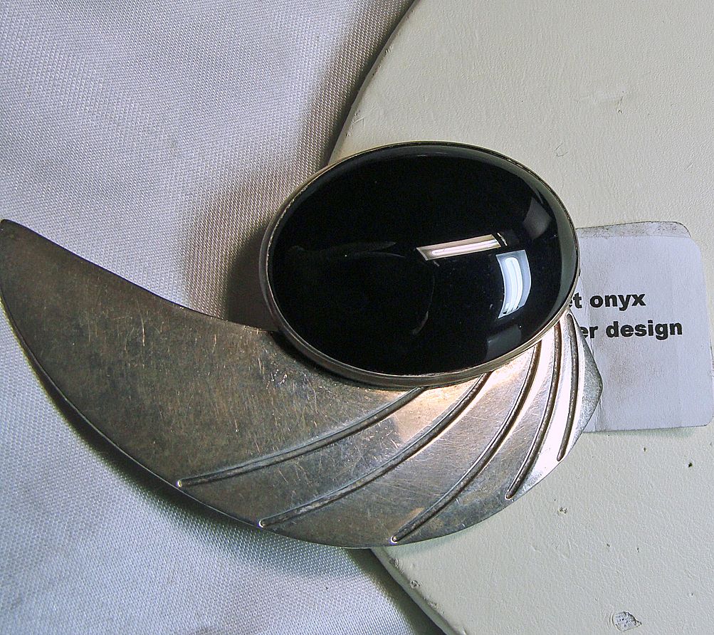 Sterling Silver and Black Onyx In a Modern Abstract Style Broach Sterling Silver and Black Onyx In a Modern Abstract Style Broach