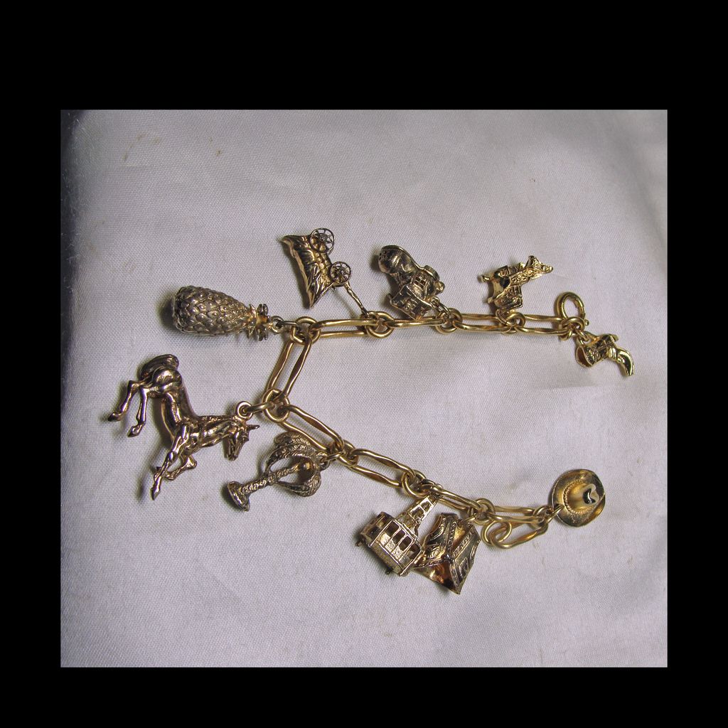 Early 1970s Palm Springs Gold Filled and Sterling Charm Bracelet Early 1970s Palm Springs Gold Filled and Sterling Charm Bracelet