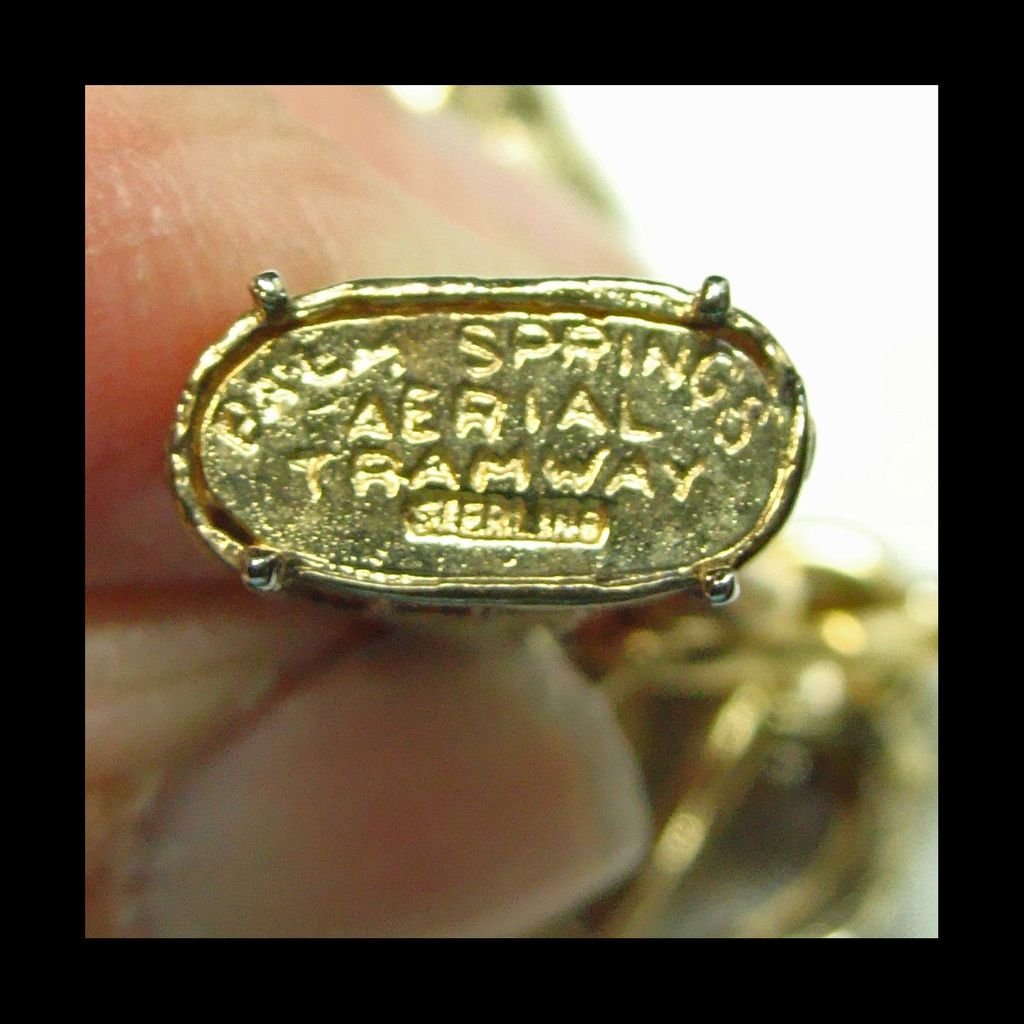 Early 1970s Palm Springs Gold Filled and Sterling Charm Bracelet Early 1970s Palm Springs Gold Filled and Sterling Charm Bracelet