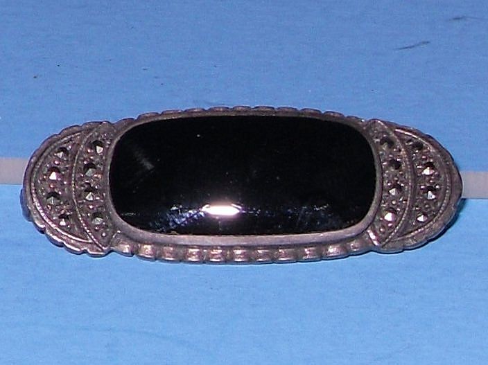 Sterling Broach with Black Onyx and Marcasites Sterling Broach with Black Onyx and Marcasites