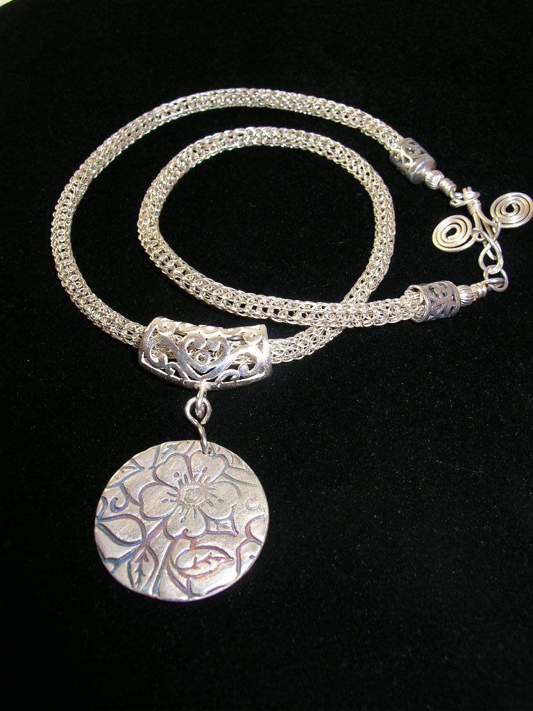 Viking Knit Weave Necklace with Flower Pendant Viking Knit Weave Necklace with Flower Pendant