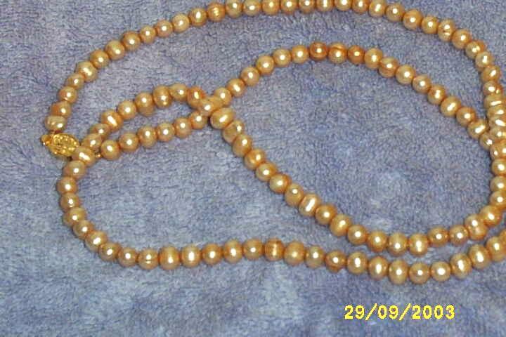 Hand Knotted Dusty Peach/Pink Fresh Water Pearl Necklace Rice Shaped Hand Knotted Dusty Peach/Pink Fresh Water Pearl Necklace Rice Shaped