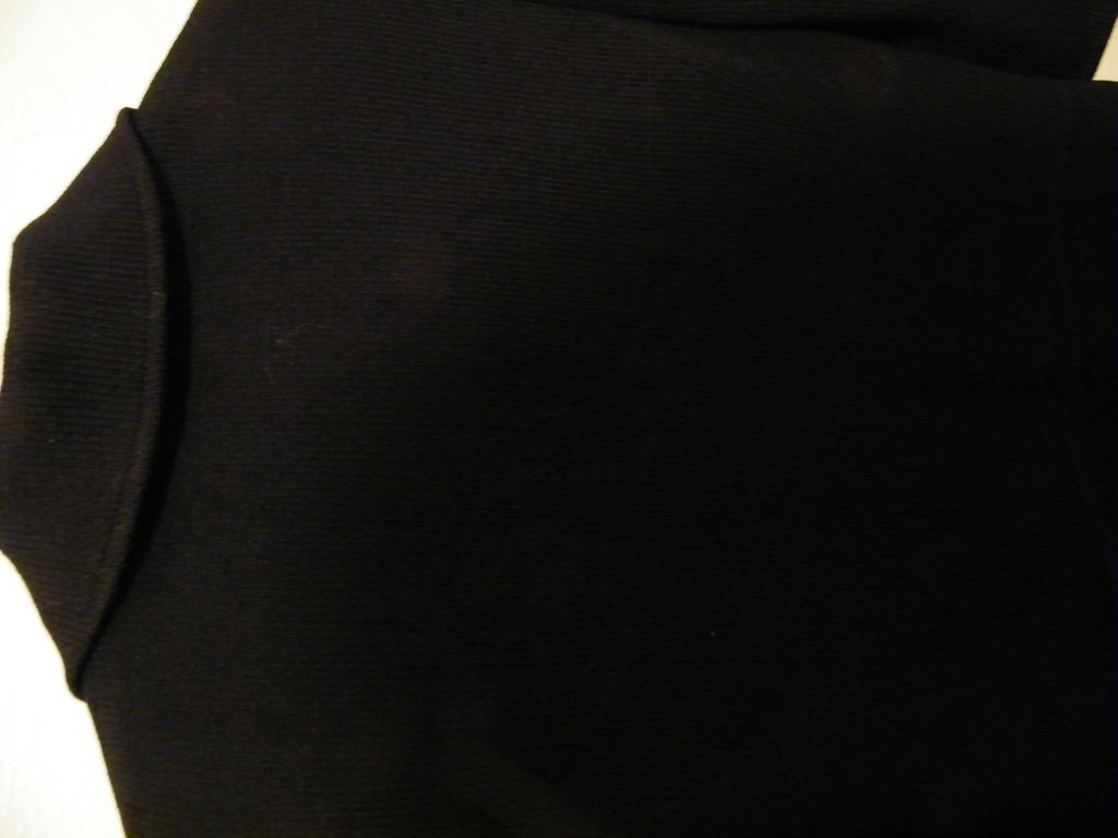 St John Knit 2-Piece Suit in Black Boucle..Excellent Condition..Size 2 St John Knit 2-Piece Suit in Black Boucle..Excellent Condition..Size 2