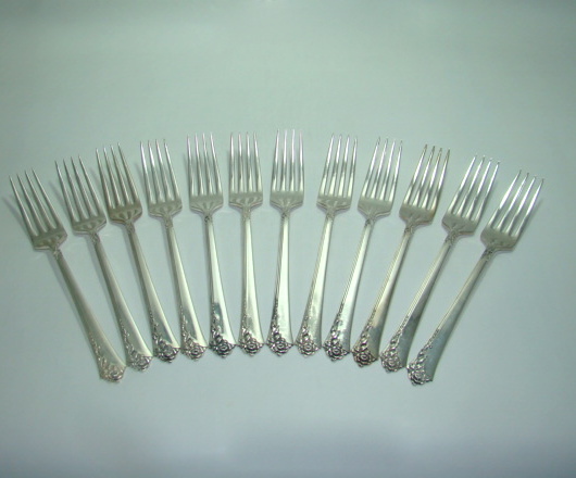 64-Piece Heirloom Sterling Silver Oneida Dinnerware Set `Damask Rose' Pattern Includes Storage Box Circa: 1946 64-Piece Heirloom Sterling Silver Oneida Dinnerware Set `Damask Rose' Pattern Includes Storage Box Circa: 1946