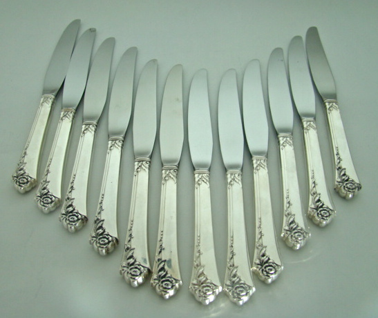 64-Piece Heirloom Sterling Silver Oneida Dinnerware Set `Damask Rose' Pattern Includes Storage Box Circa: 1946 64-Piece Heirloom Sterling Silver Oneida Dinnerware Set `Damask Rose' Pattern Includes Storage Box Circa: 1946