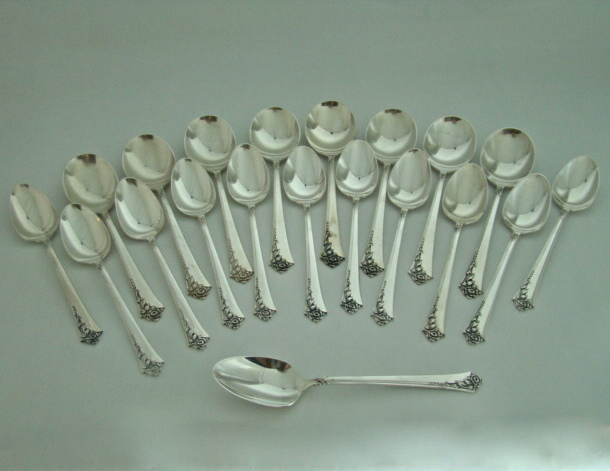 64-Piece Heirloom Sterling Silver Oneida Dinnerware Set `Damask Rose' Pattern Includes Storage Box Circa: 1946 64-Piece Heirloom Sterling Silver Oneida Dinnerware Set `Damask Rose' Pattern Includes Storage Box Circa: 1946