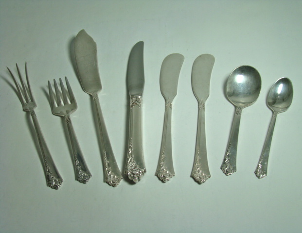 64-Piece Heirloom Sterling Silver Oneida Dinnerware Set `Damask Rose' Pattern Includes Storage Box Circa: 1946 64-Piece Heirloom Sterling Silver Oneida Dinnerware Set `Damask Rose' Pattern Includes Storage Box Circa: 1946