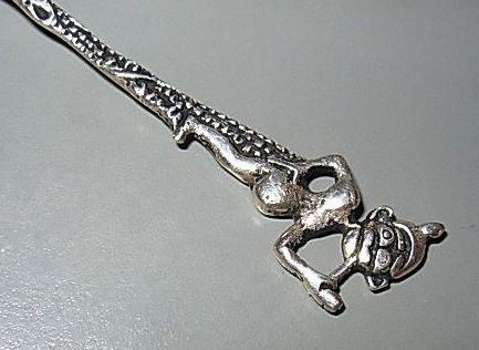 Ornate Sterling Silver Spoon - Figural Ornate Sterling Silver Spoon - Figural