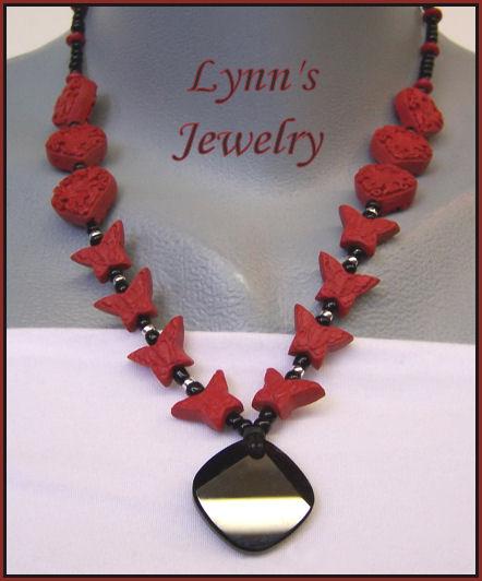 Dramatic Carved Cinnabar Jet Swarovski Crystal Pendant Sterling Silver Necklace Dramatic Carved Cinnabar Jet Swarovski Crystal Pendant Sterling Silver Necklace