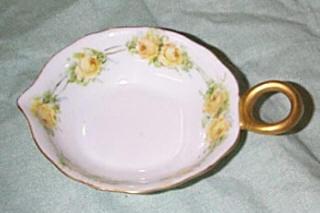 Small hand china painted handled nappy Small hand china painted handled nappy