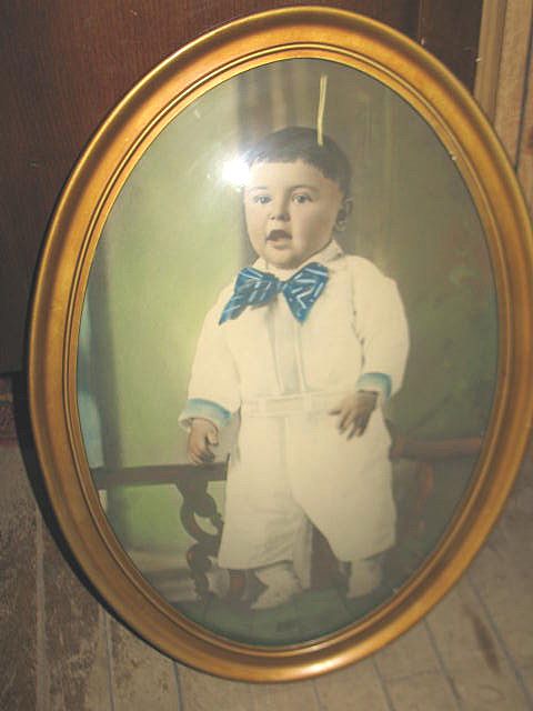 Hand Colored Photo of Boy in Oval Curved Glass Frame Hand Colored Photo of Boy in Oval Curved Glass Frame