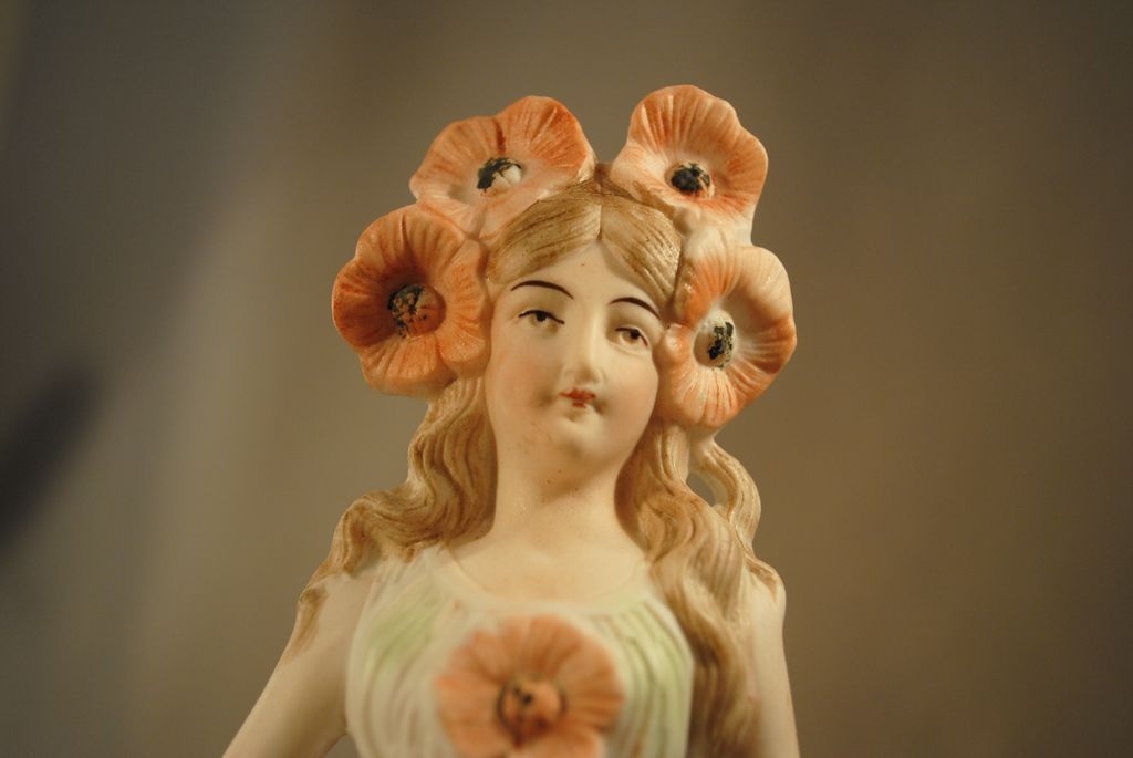 German Porcelain Figure with Poppies German Porcelain Figure with Poppies