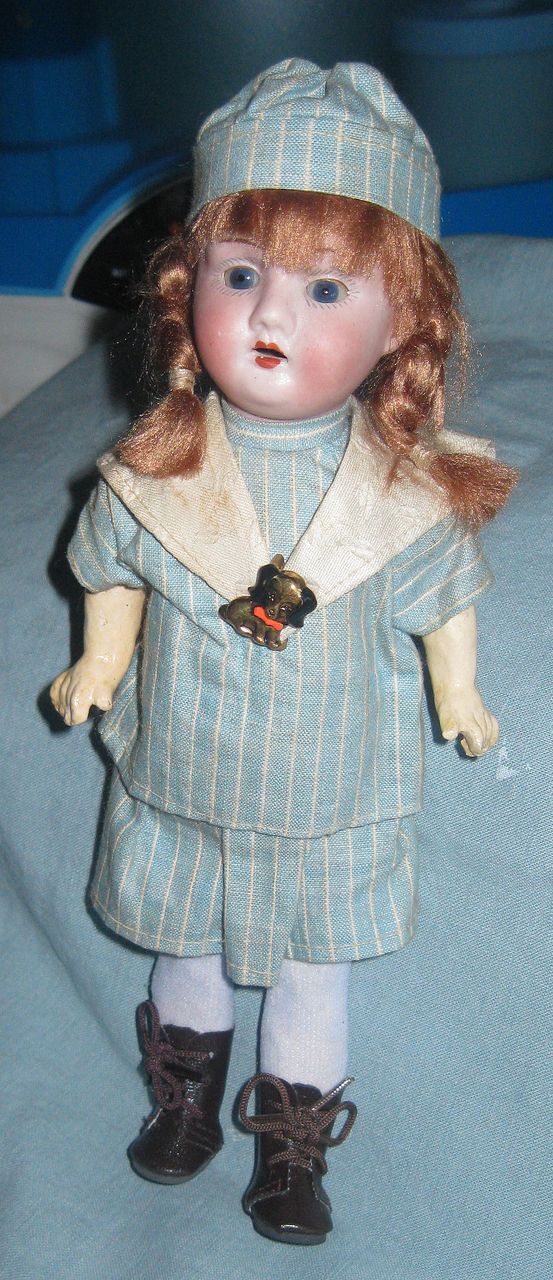 12" Mystery German Bisque Doll in Original Clothes. 12" Mystery German Bisque Doll in Original Clothes.