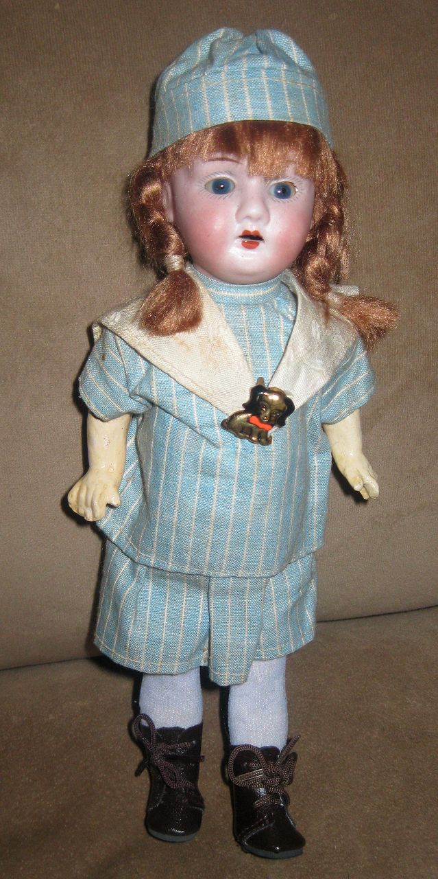 12" Mystery German Bisque Doll in Original Clothes. 12" Mystery German Bisque Doll in Original Clothes.