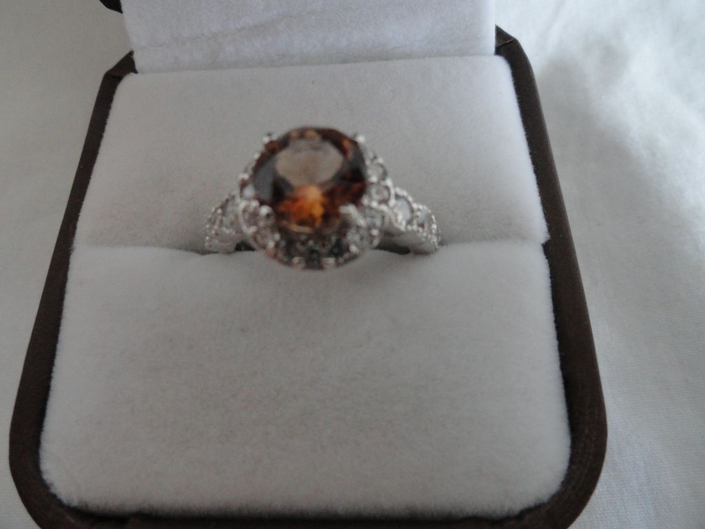 Stunning Champagne Topaz Ring Surrounded by White Sapphires & Zircons Stunning Champagne Topaz Ring Surrounded by White Sapphires & Zircons