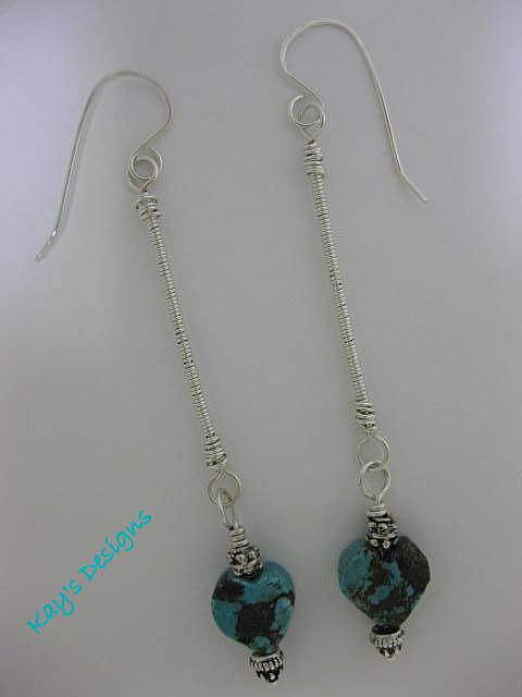 Sterling silver stiletto coiled earrings with heart shaped turquoise drop Sterling silver stiletto coiled earrings with heart shaped turquoise drop